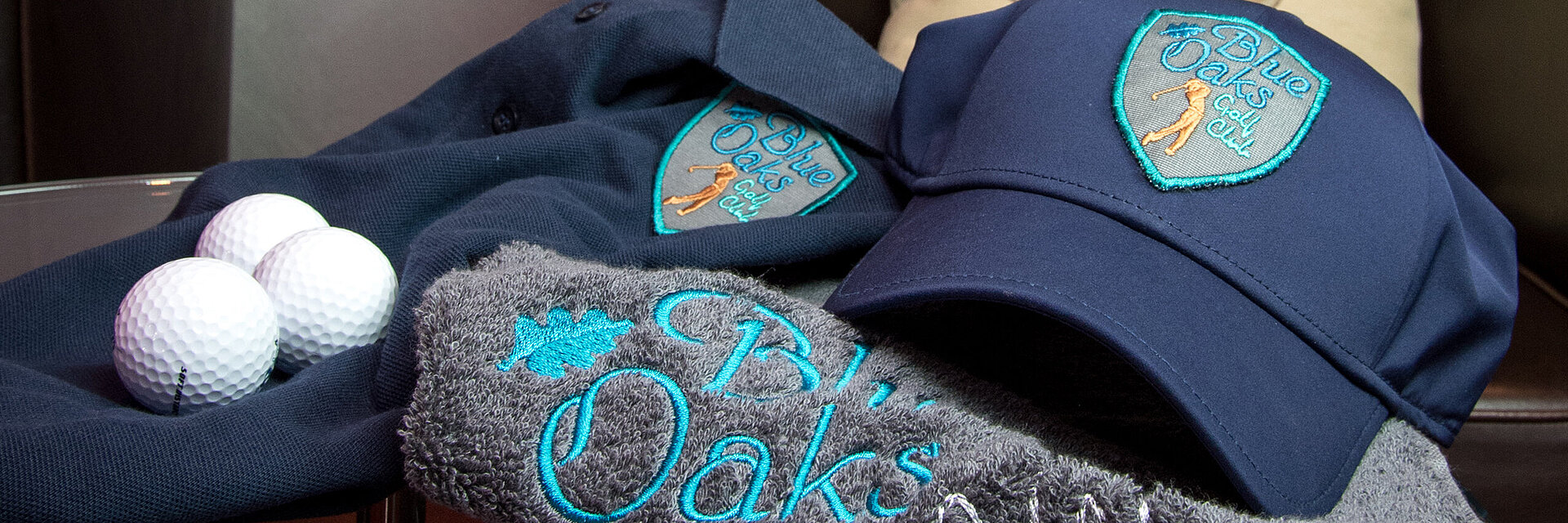 [Translate to Vietnamesisch:] Embroidered golf towel and cap