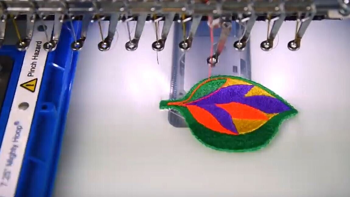 [Translate to Hongkong (Englisch):] Patch being embroiders on heatsoluble film on an embroidery machine