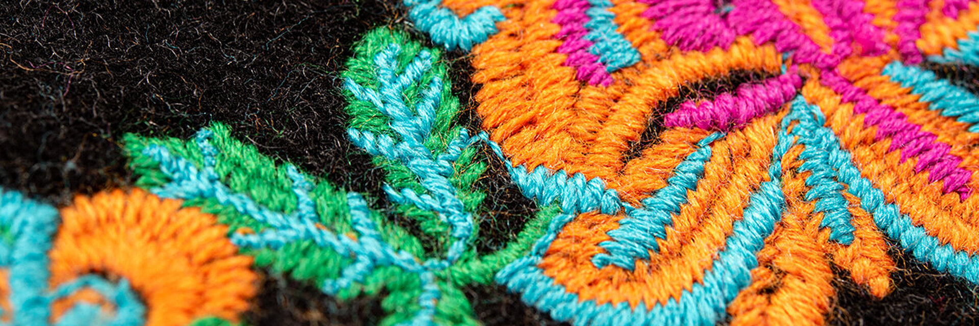Embroidery of a flower with thick thread