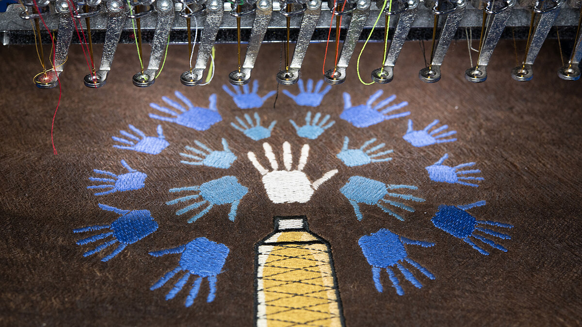 Embroidering a tree with lyocell thread on an industrial machine
