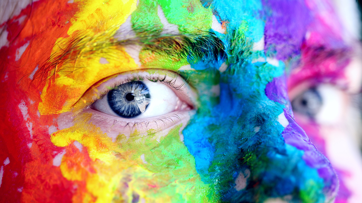 [Translate to Hongkong (Englisch):] face body painted with many different colours