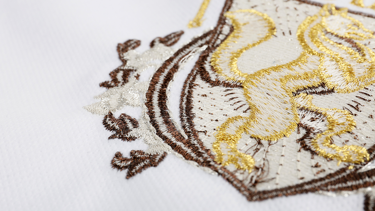 [Translate to Hongkong (Englisch):] emblem embroidery backside with underthread
